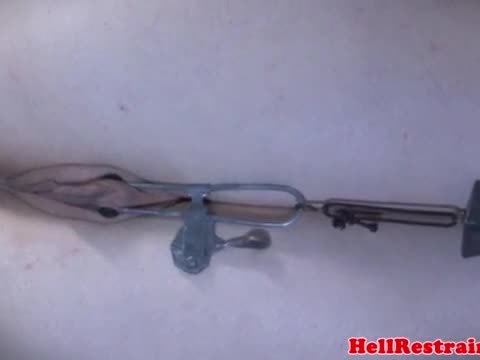 Collared slave pussyclamped while restrained